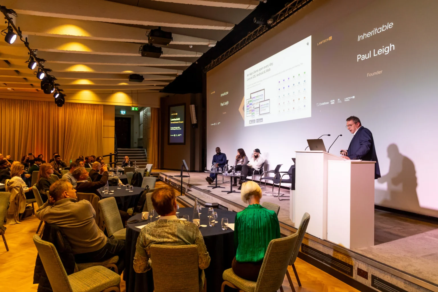 Inheritable's founder presenting on stage at the LawtechUK Investment Event in London